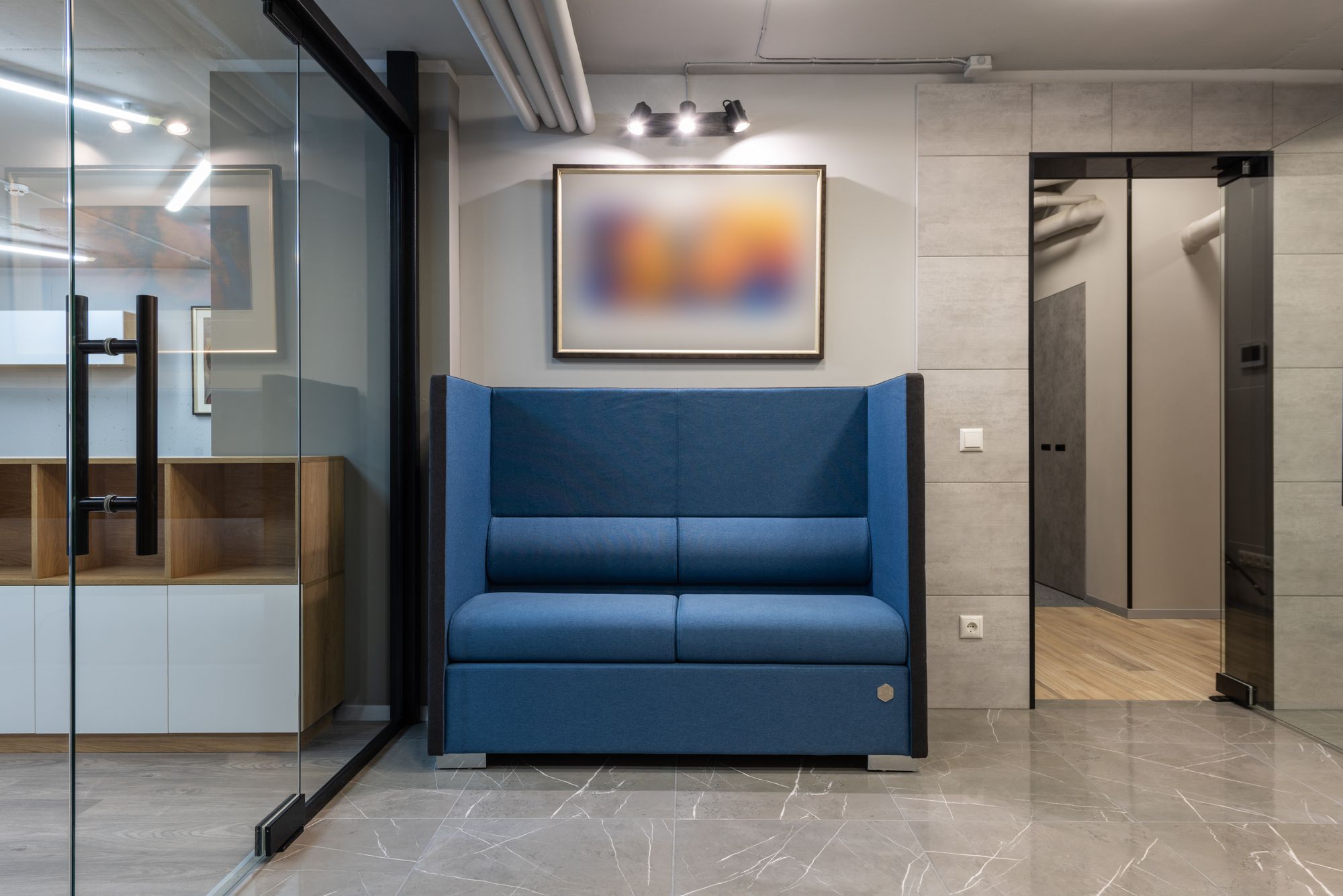 Clean, modern office lobby with glass doors